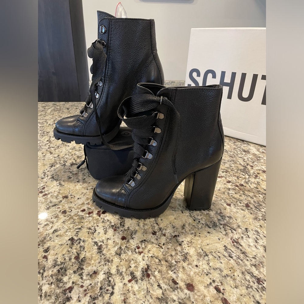 Schultz Zhara high heel boot in black leather. Size 7B NWT